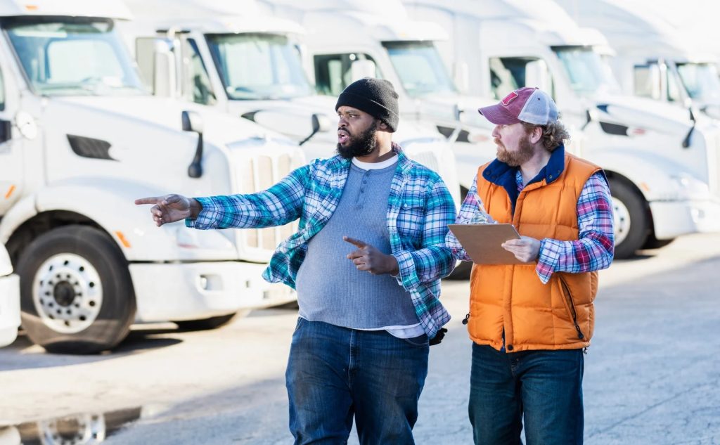 Fleet Managers Discussing Trucks